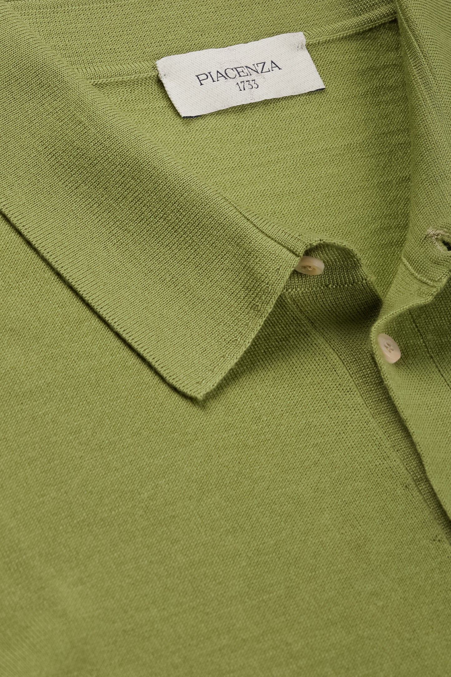 Green long sleeve polo shirt