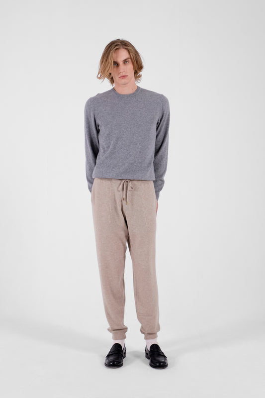 Beige jogging trousers with narrow bottom
