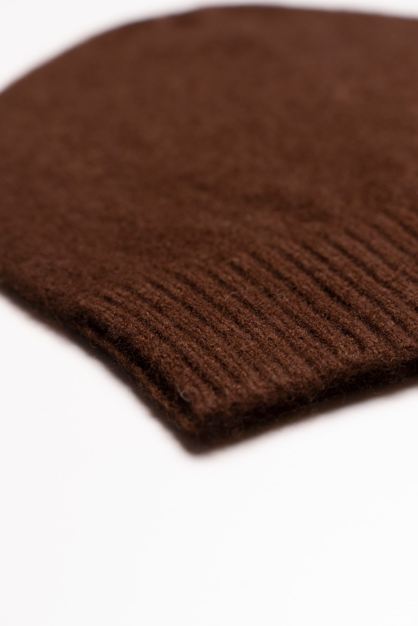 Brown shaved cap with ribbed bottom