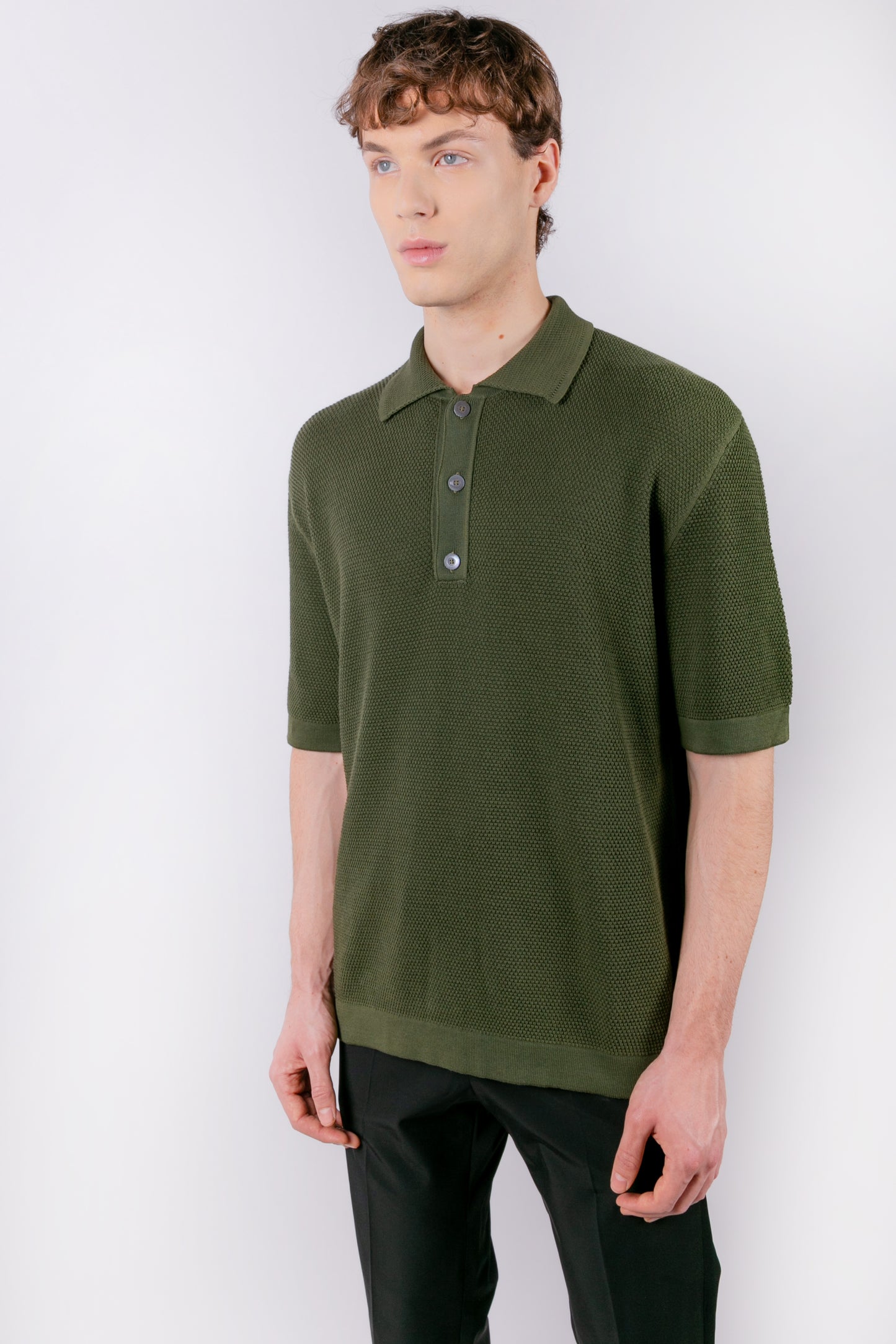 Green short-sleeved polo shirt in macro piqué cotton